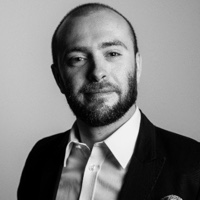 A portrait of Janusz Żak from testimonial